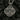 Detailed silver Orthodox Crucifix pendant featuring Jesus Christ and saints with oxidized finish on black coal background