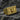 Gold vermeil rectangular signet ring featuring S and A initials with central skull design on textured background