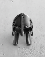 Front view of sterling silver warrior helmet ring with distinct eye slits and nose guard