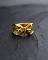 Gold variant of the handcrafted butterfly ring showing the same intricate wing details and segmented body design