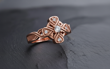 Side profile of rose gold Celtic cross ring variant displaying woven band pattern and stippled texture design
