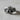 Front view of 925 sterling silver skull ring featuring a hooded grim reaper design