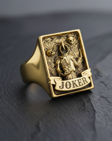 Gold vermeil Joker signet ring with jester figure and skull details on textured background