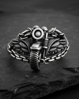 Front view of 925 sterling silver biker motorcycle ring with eagle wings and chain link band on black slate background