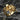 Close-up of 14K gold vermeil spider ring with realistic texture displayed on dark natural stone background