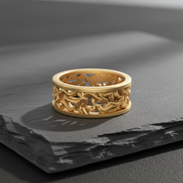 Perspective view of gold plated tree branch ring showcasing openwork band details and organic texture