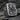Detailed close-up of Christian saints Peter and Paul carved into rectangular face of sterling silver religious ring
