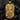 Reverse side of silver religious dog tag pendant showing engraved prayer text and cross symbol on dark background