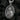 Oxidized Silver Saint Hildegard Pendant featuring detailed relief of the saint holding a book on dark stone background