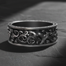 Handcrafted Silver Rococo Band Ring featuring deep relief floral scrollwork on a dark textured background
