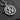 Angled view of interlocking double Venus pendant in 925 sterling silver showing detailed craftsmanship