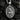 Front view of 925 sterling silver Saint Genevieve pendant with candle and lamb details on black coals