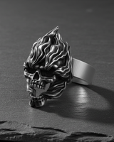 Handcrafted 925 sterling silver flaming skull ring featuring intricate fire details on dark background