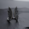 Front view of oxidized 925 sterling silver angel wings ring showing diamond accents