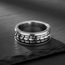 Side profile of handcrafted silver dragon ring showing intricate scale pattern and beaded edges
