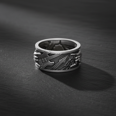 925 sterling silver rock guitar ring featuring electric bass and guitar relief on dark stone background