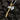 Two tone 925 sterling silver axe pendant with gold plated handle and polished blades on coal background