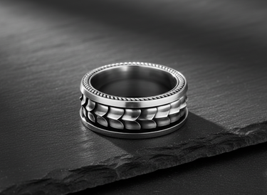 Side view of handcrafted 925 sterling silver dragon ring showing scale texture and thickness