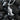 Polished 925 sterling silver praying hands pendant displaying intricate finger details on dark background