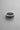 Detailed close-up of movable curb chain links on a handcrafted sterling silver spinner ring