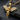 Gold vermeil over sterling silver angel pendant with diamond encrusted wings on black stone