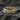 14K gold vermeil silver twig ring with intertwined branch design displayed on dark textured stone