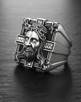 Angled view of handcrafted 925 silver religious ring with Jesus portrait and fleur-de-lis corners