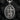 Detailed view of silver St. Joseph of Cupertino pendant with cross design and textured finish on black background