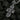 Front view of 925 sterling silver Orthodox cross pendant featuring Jesus Crucifixion and angel bail on black coal background