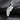 925 sterling silver angel wing pendant featuring detailed feather texture on black slate background