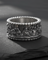 Side view of 925 sterling silver religious band ring with rope edge details and oxidized finish