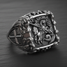 Side view of sterling silver St George ring displaying Christian cross shield and ornate baroque scrollwork