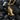 Gold vermeil praying hands pendant with intricate finger details displayed on black background