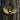 Gold vermeil Spartan warrior helmet necklace with feathered wings design displayed in nature setting
