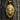 Gold plated variation of Native American chief pendant showing detailed war bonnet and realistic facial features