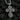 Angled view of handcrafted silver religious pendant displaying thick durable design and intricate Christian iconography