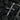 Side view of 925 sterling silver cross pendant with vine leaves on black charcoal background