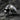 Side profile of 925 sterling silver evil clown ring showing oxidized texture and menacing skull details