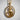 Close-up of gold vermeil curled tail cat pendant showing intricate facial details and elegant oval frame design