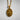 Handcrafted sterling silver Saint Therese pendant attached to a sturdy chain resting on textured background.