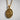 Handcrafted oxidized silver Saint Anne pendant featuring deep contrast and shadows against a textured white background