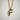 Bird Letter F Pendant, gold vermeil, front view against white textured wall