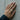 Gemini Maidens Ring, worn on model hand against concrete wall