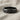 Celtic Braided Knot Ring, black rhodium, front view on linen