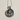 Close-up flat lay of oxidized silver Virgo zodiac pendant highlighting intricate flowing hair and 3D relief details