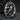 Close-up of the handcrafted oxidized silver rock climber ring displaying intricate details on dark stone surface
