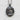 Close-up of handcrafted baby girl pendant showing the dark oxidized silver finish and adorable expressive eyes
