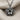 Layered Lotus Pendant, oxidized, front view on fabric