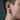 Close-up of brutalist gear hoop earring worn by a male model showcasing oxidized silver finish and thickness