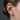 Side view of the non-pierced Ichthys cuff earring worn on ear cartilage showing the secure spring-tension grip design